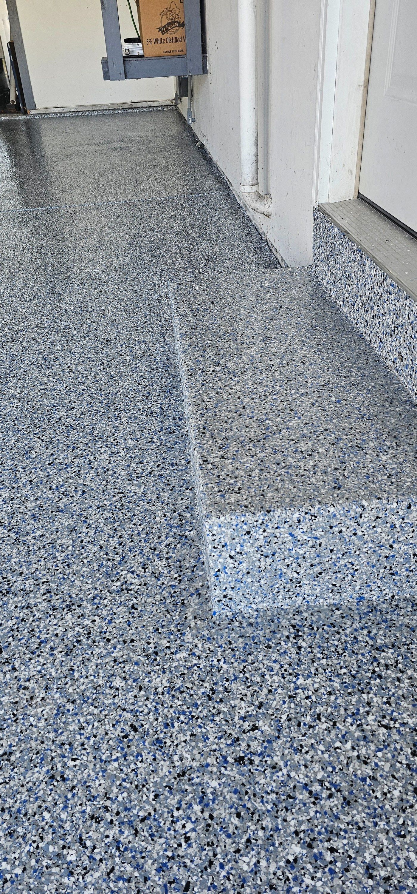 Sidewalk and porch of house with concrete coatings