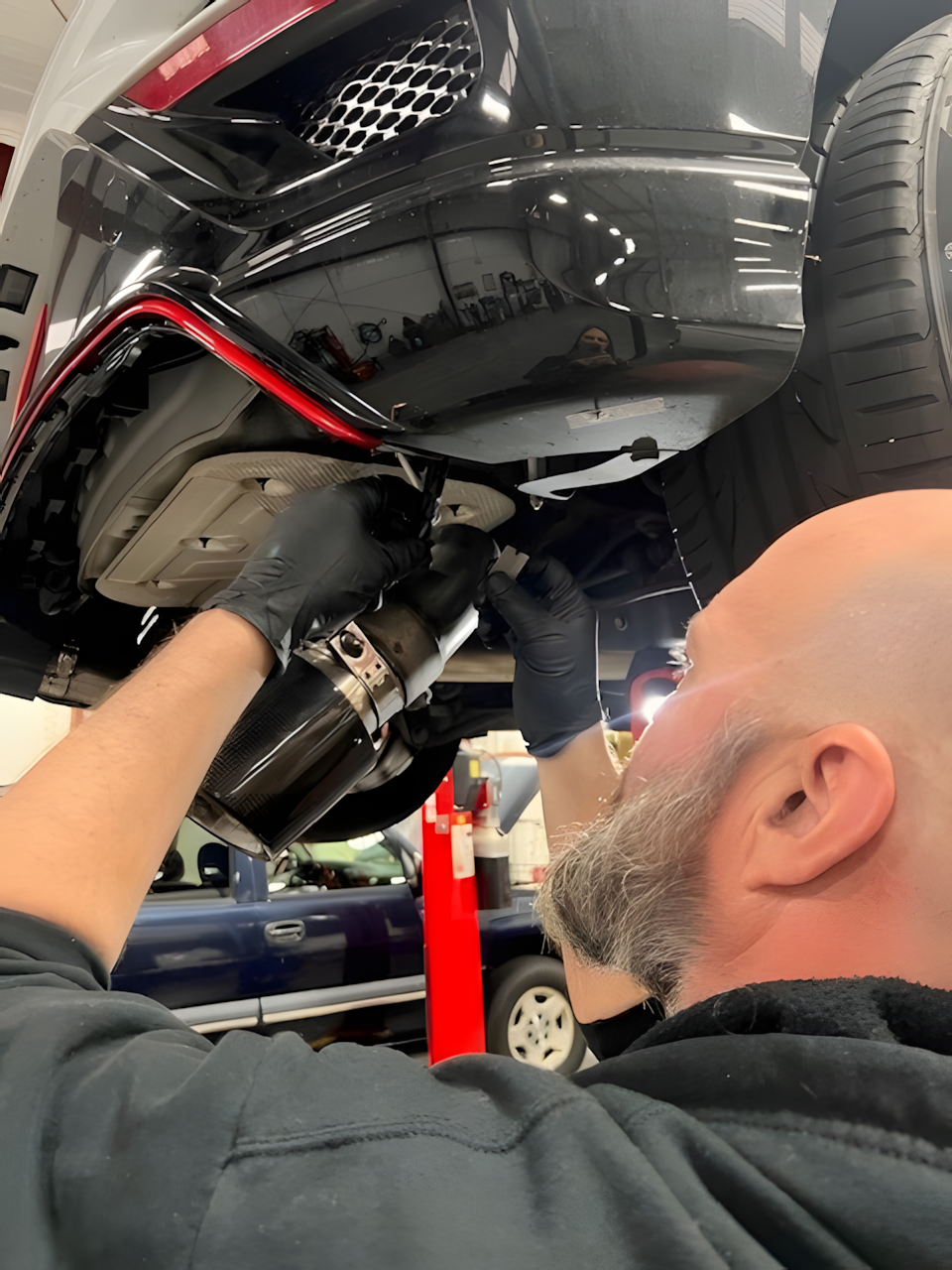 Team Member Working Underside of Car | Japanese Auto Masters