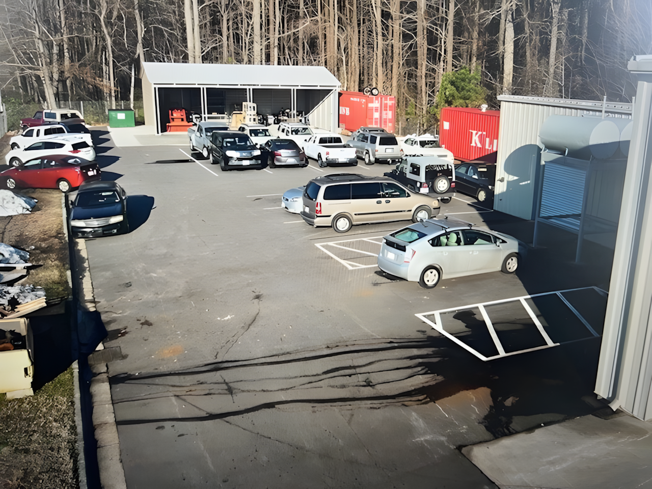 Parking Lot with Various Cars Near The Shop | Japanese Auto Masters