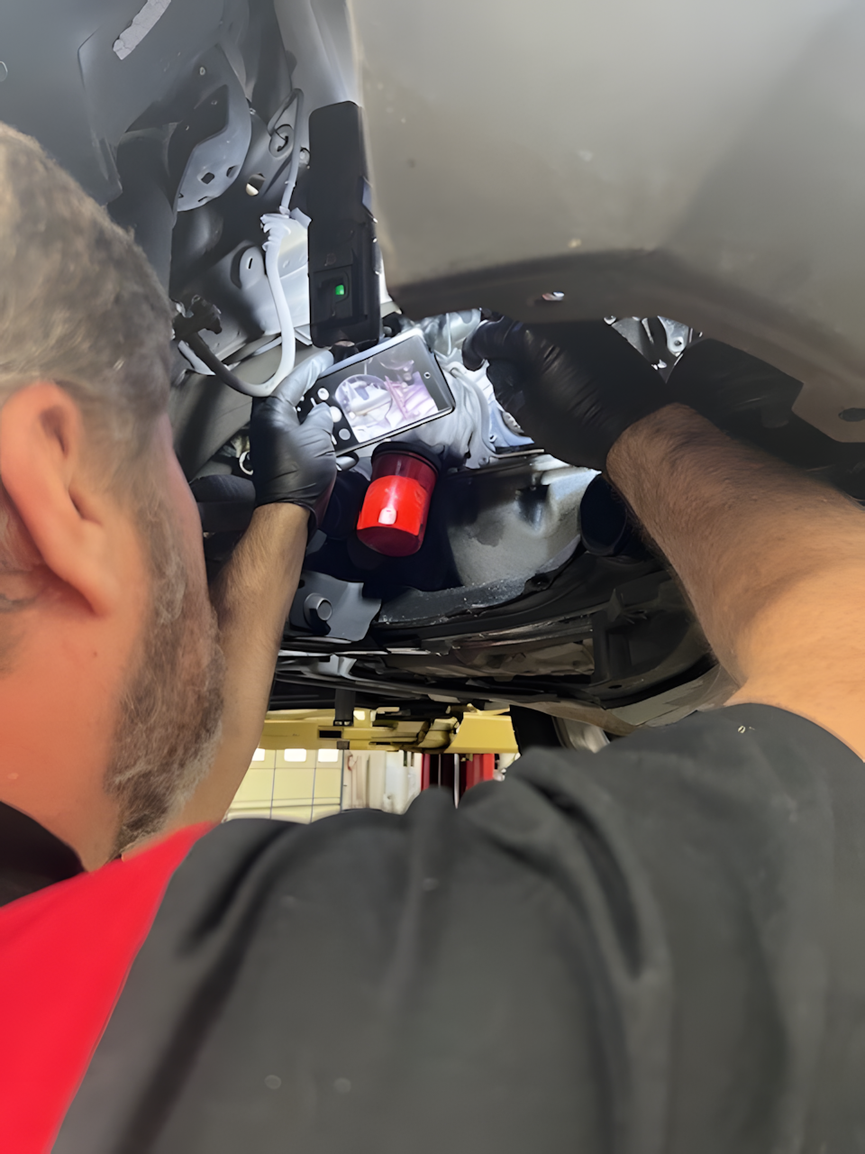 Team Member Changing Oil Filter | Japanese Auto Masters