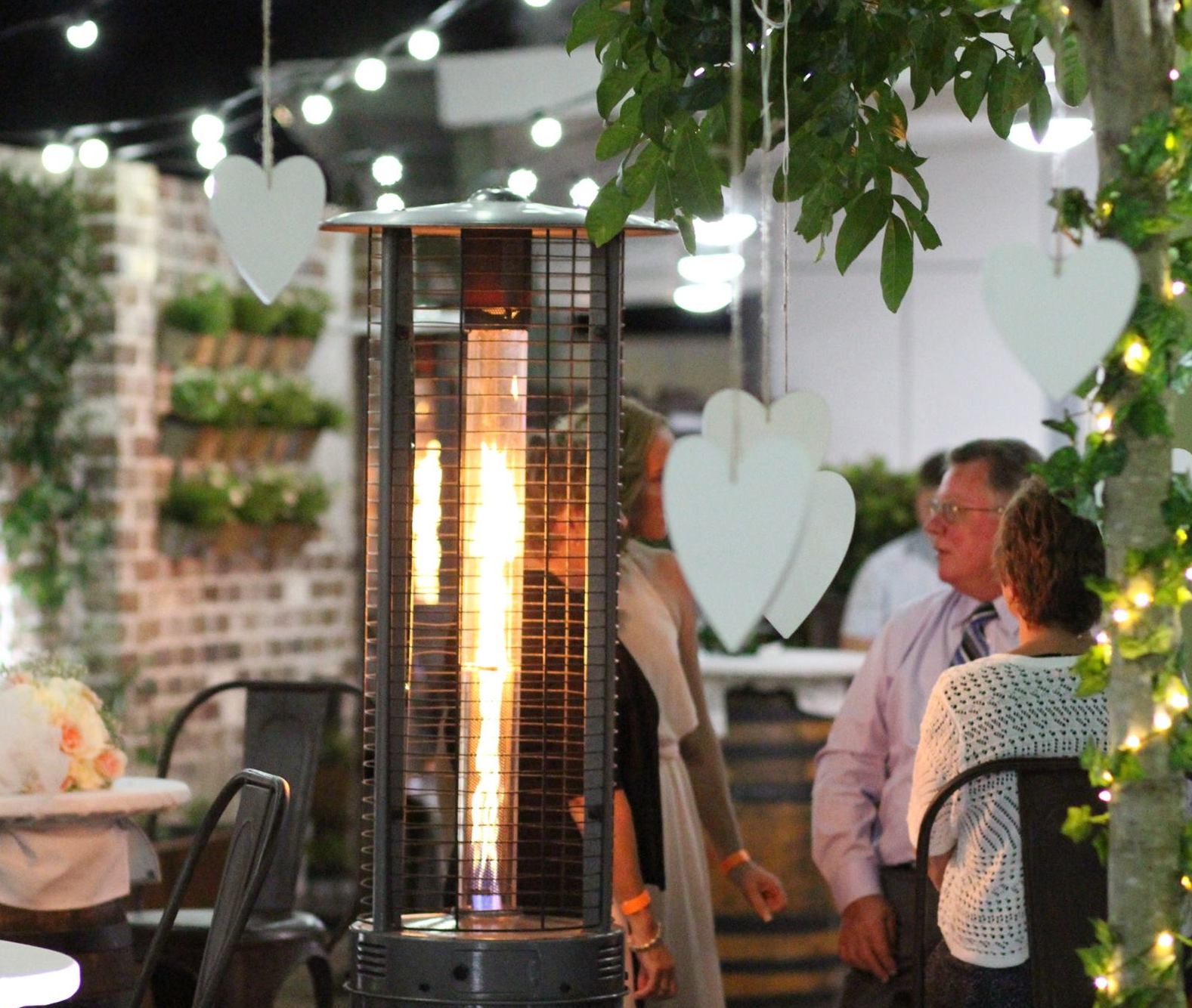 lantern patio heater and love hearts at The Birdcage wedding reception venue  on the Sunny Coast