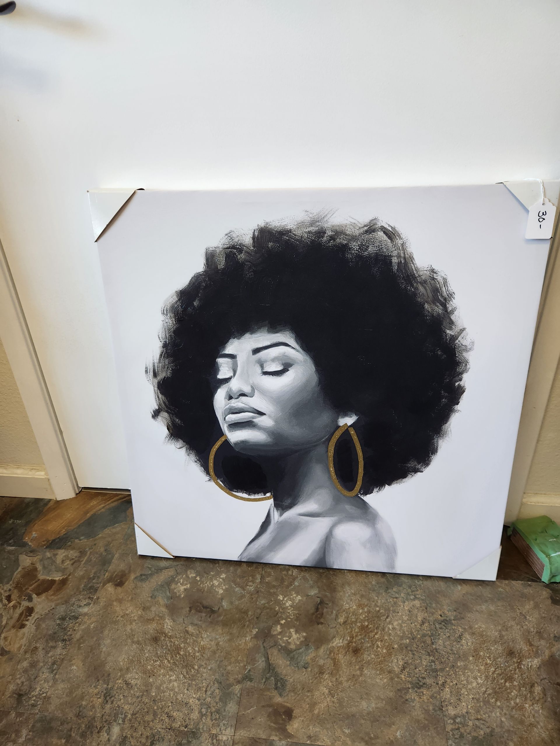 A black and white painting of a woman with an afro and hoop earrings.