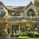 House with Dark White Vinyl Siding — Governor John Sevier Knoxville, Tennessee — Goddard Continuous Guttering