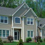 House with Gray Vinyl Siding — Governor John Sevier Knoxville, Tennessee — Goddard Continuous Guttering