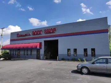 A gray commercial building labeled 