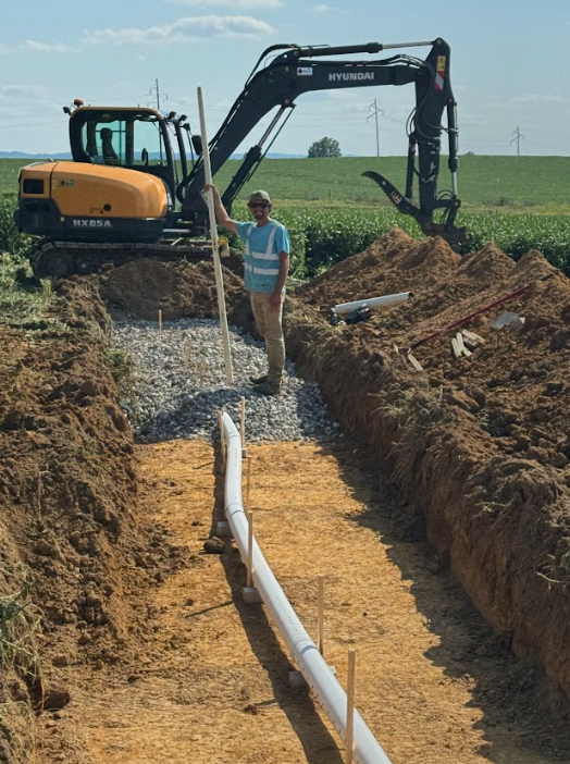 A pile of white rocks on the side of a building.