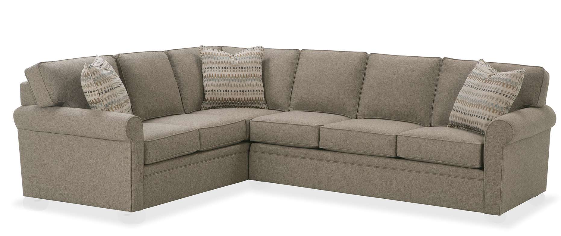 a sectional couch with pillows on it is on a white background .