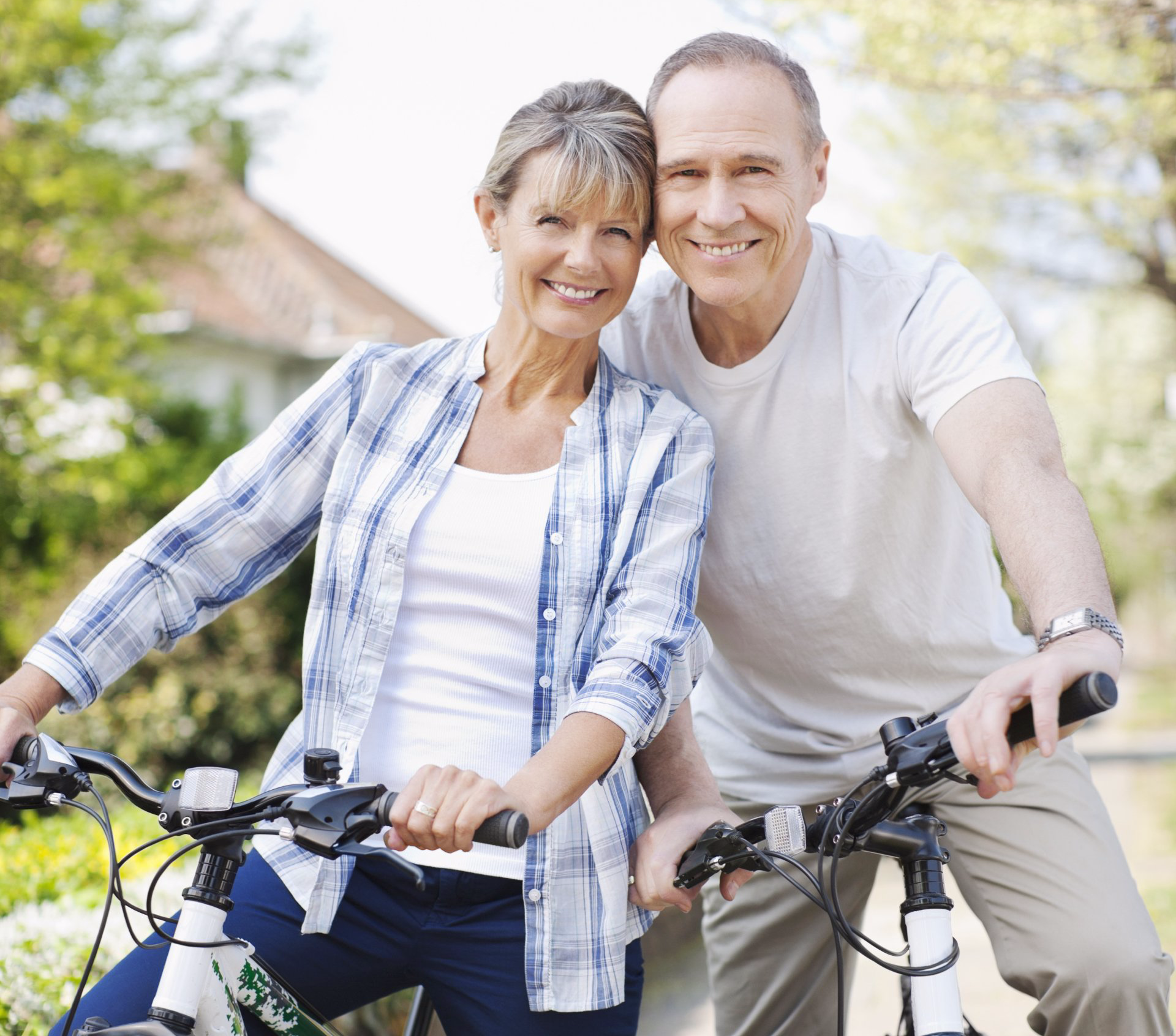 man and woman riding bicycles