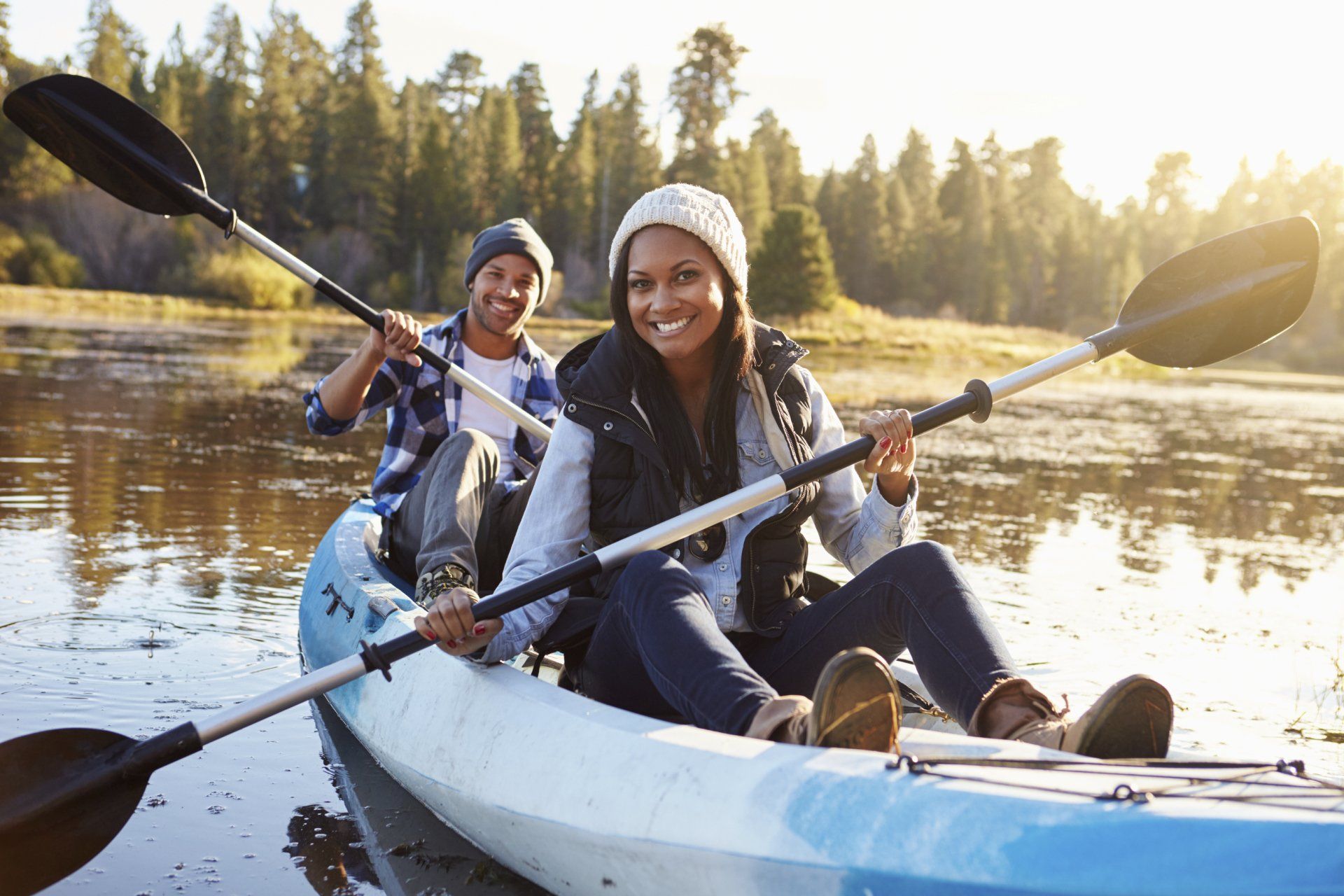young couple kayaking