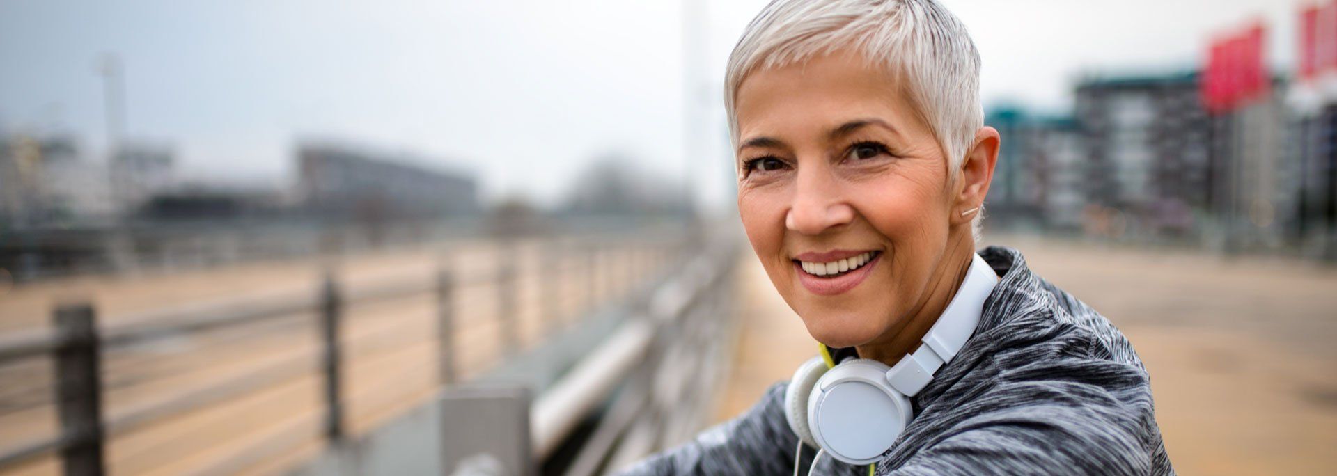 woman smiling with headphones