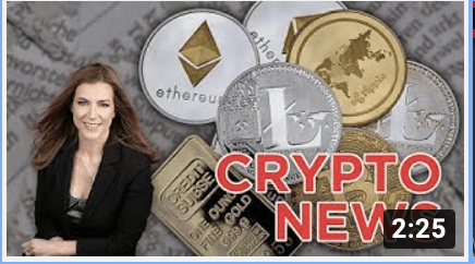 A woman is sitting in front of a pile of coins.