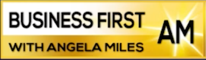 A gold sign that says business first am with angela miles