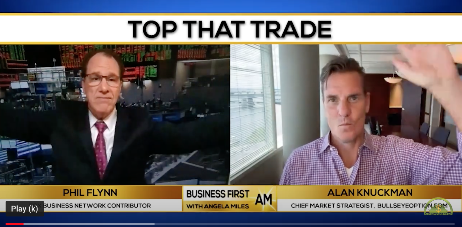 Two men are on a television show called top that trade