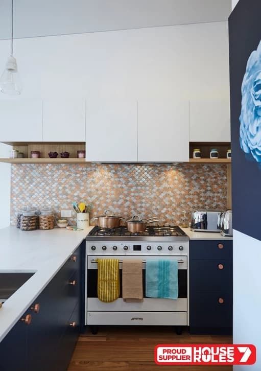 A Kitchen With a Stove and a Sign That Says Proud of the House 7 — Paiano Custom Kitchens In Corrimal, NSW
