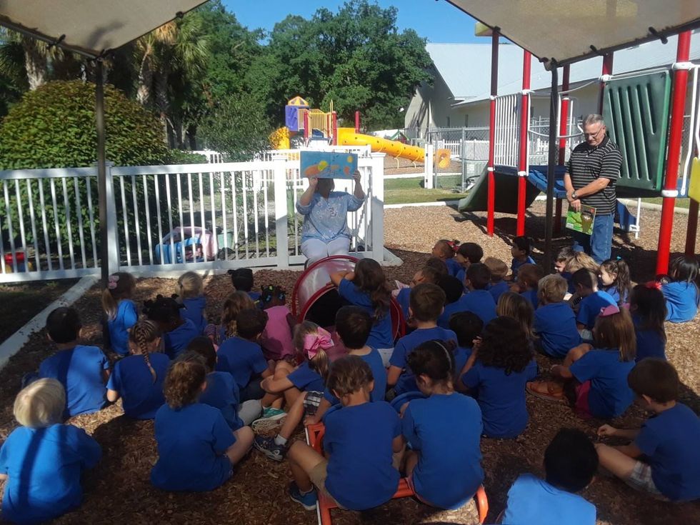 Teacher Teaching The Children — Naples, FL — Eagle's Nest Worship Center