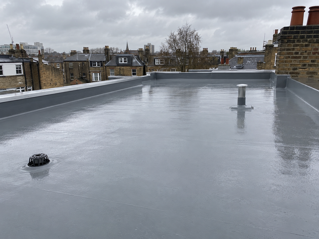 New grey GRP fibreglass flat roof with edge trims