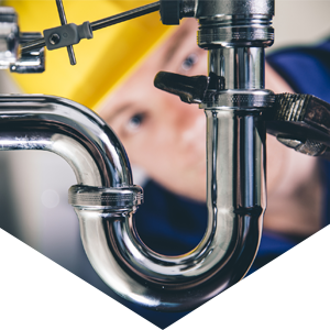 Plumber Fixing a Drain — Rockford, IL — ProTech Plumbing Heating & Cooling