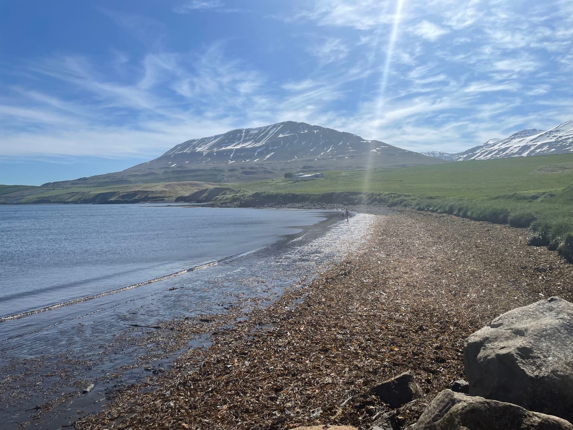 Hraundrangi mountain range with a cloudy sky in the background
