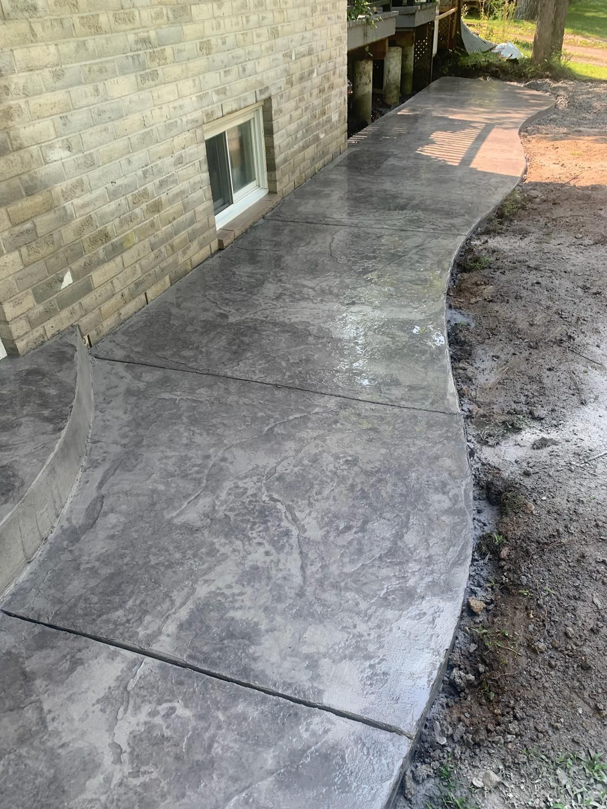 concrete pathway beside house