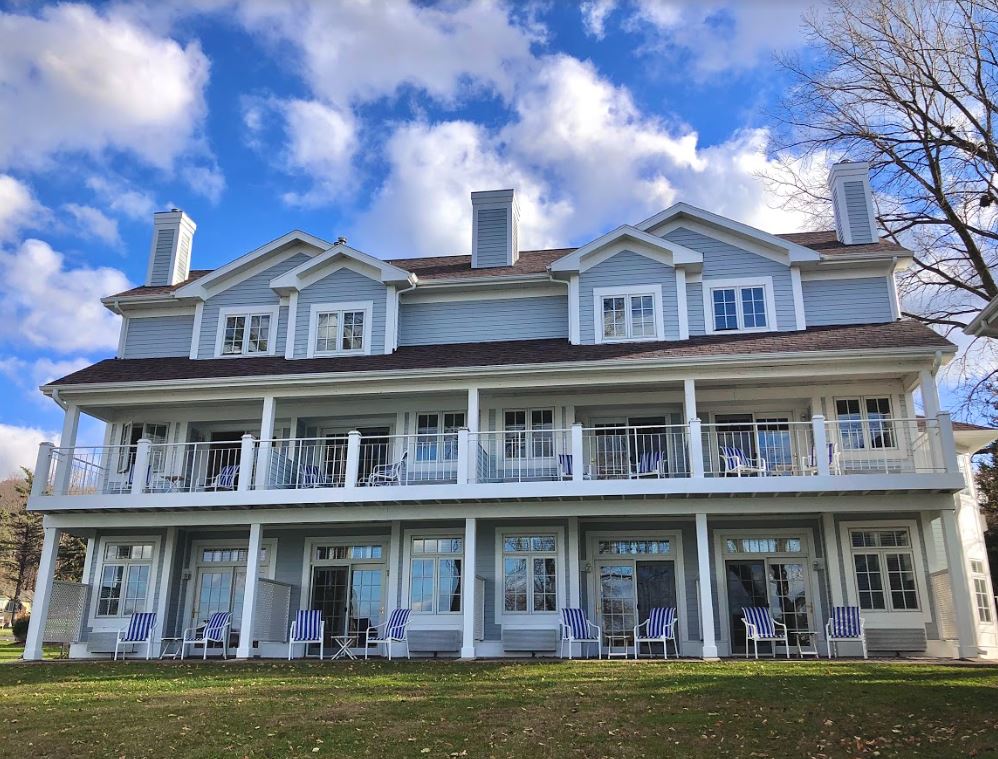 A large house with a lot of windows and balconies