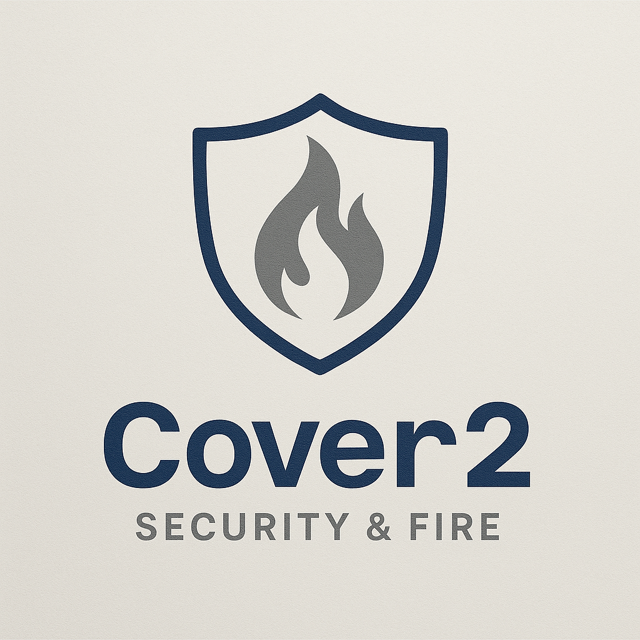 Logo for Cover 2 Security & Fire: Shield with flame icon in it, navy & gray on beige background.