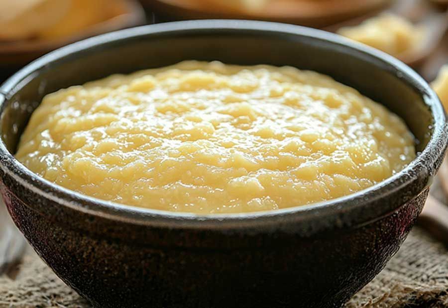 Applesauce with a cinnamon stick in smokehouse bbq