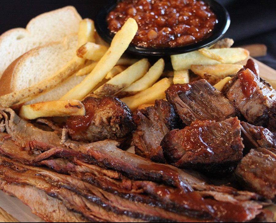 Smokehouse barbecue sliced meat and fries in Kansas City