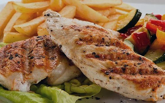 Chicken breasts , broccoli , carrots and pickles at Gladstone smokehouse bbq