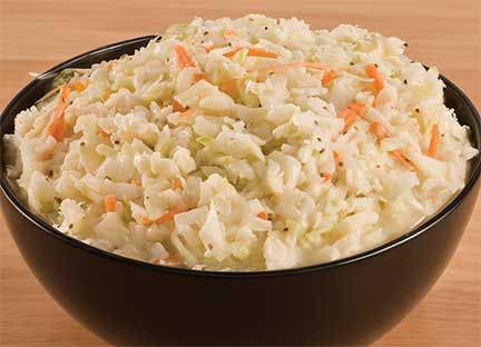 A bowl of coleslaw with carrots and celery near Independence Mo