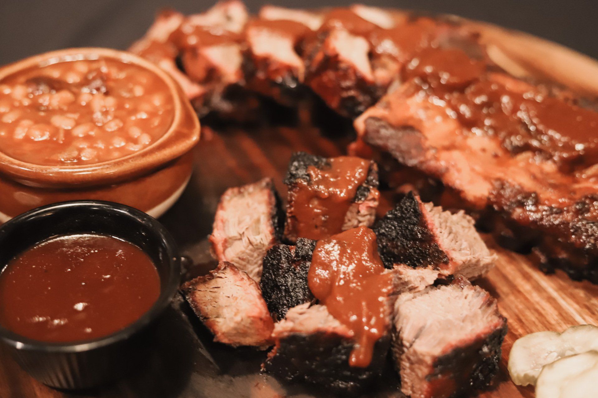 Meat , beans and sauce at smokehouse barbecue