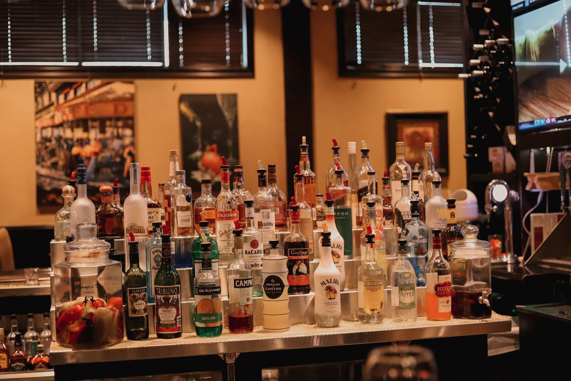 Bar filled with lots of bottles of liquor at smokehouse bbq near me