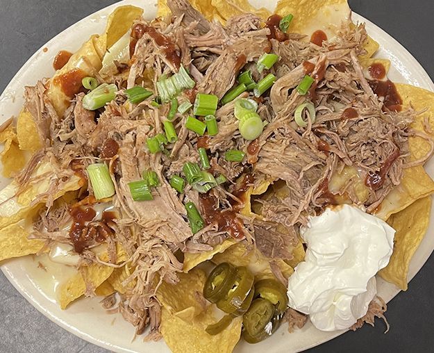 BBQ Restaurant serving pulled pork, nachos