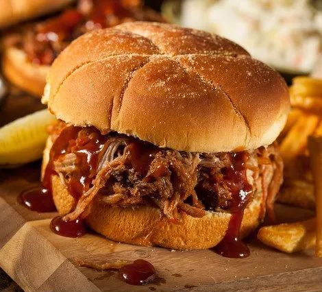 Hickory smoked Barbecue Pulled pork lunch sandwiches Smokehouse BBQ restaurant