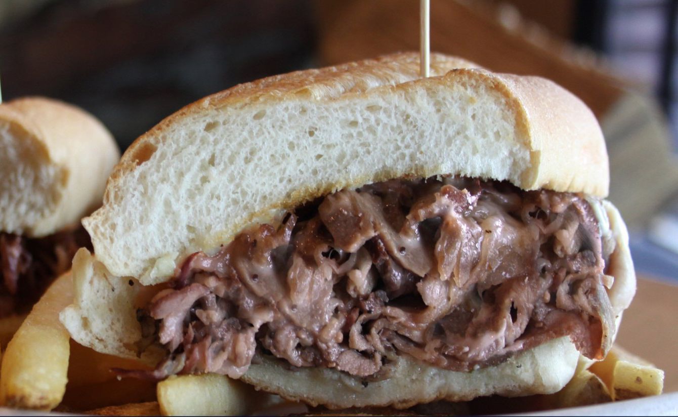 Roast beef sandwich with french fries at smokehouse barbecue restaurant