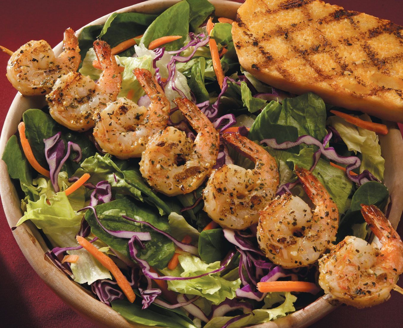 Grilled shrimp salad with garlic bread at smokehouse barbecue restaurant near me