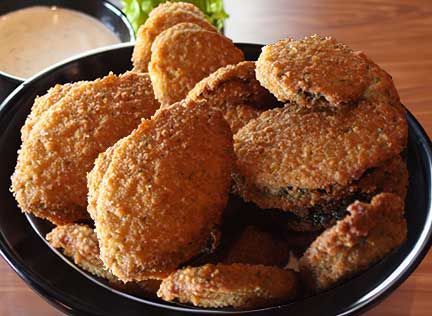 A bowl of Zucchini Slabs and dipping sauce at Smokehouse BBQ