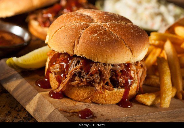 Pork sandwich and french fries at smokehouse bbq restaurant