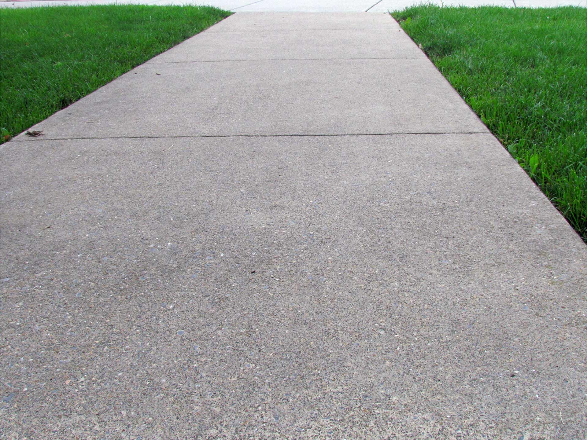 Customised Concrete Paths Designed to Enhance Eimeo Spaces