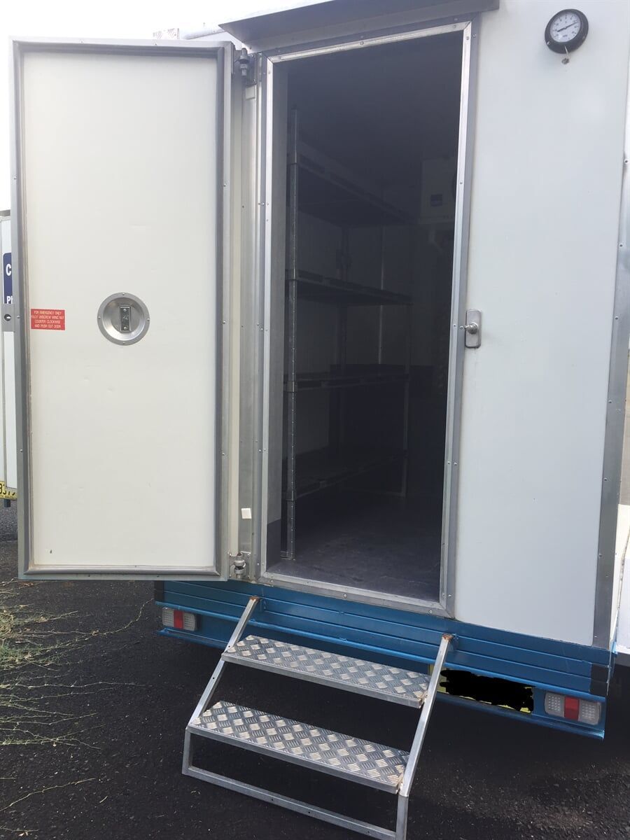 A White Trailer with the door Open and Stairs - Cool Room in Lindendale, NSW