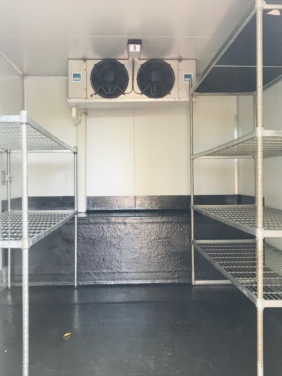 An Empty Room with Shelves and two fans on the Ceiling - Cool Room in Lindendale, NSW