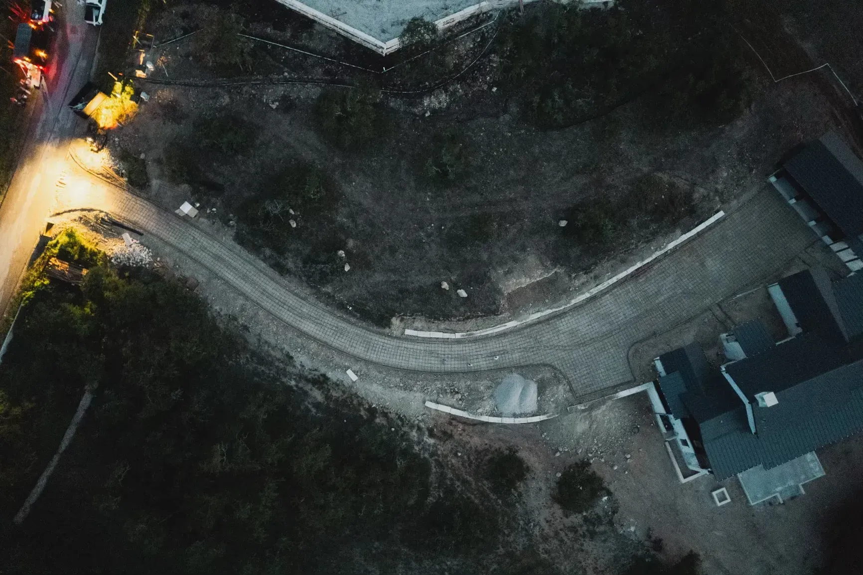 An aerial view of a residential area at night.
