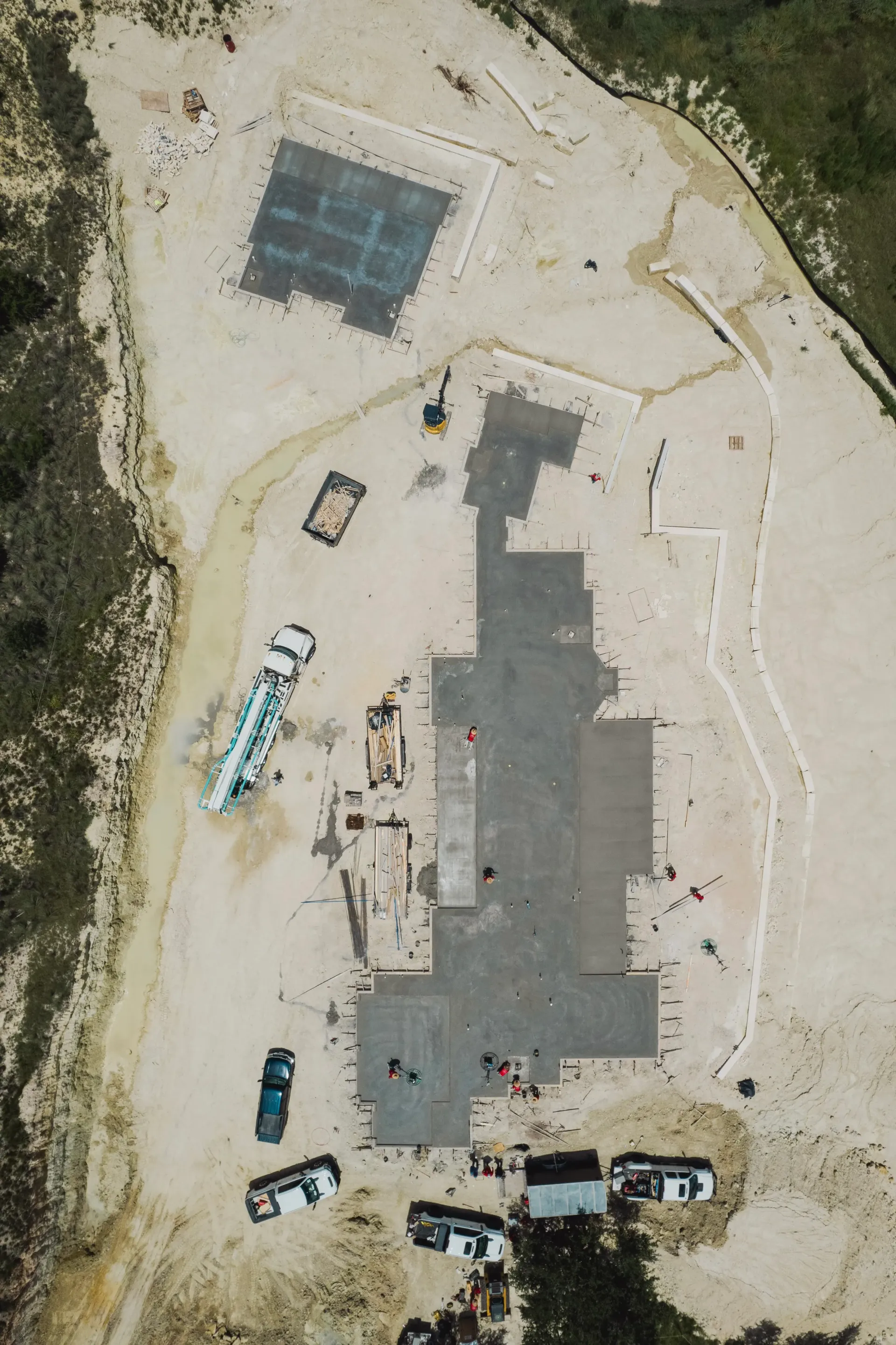 An aerial view of a large building under construction