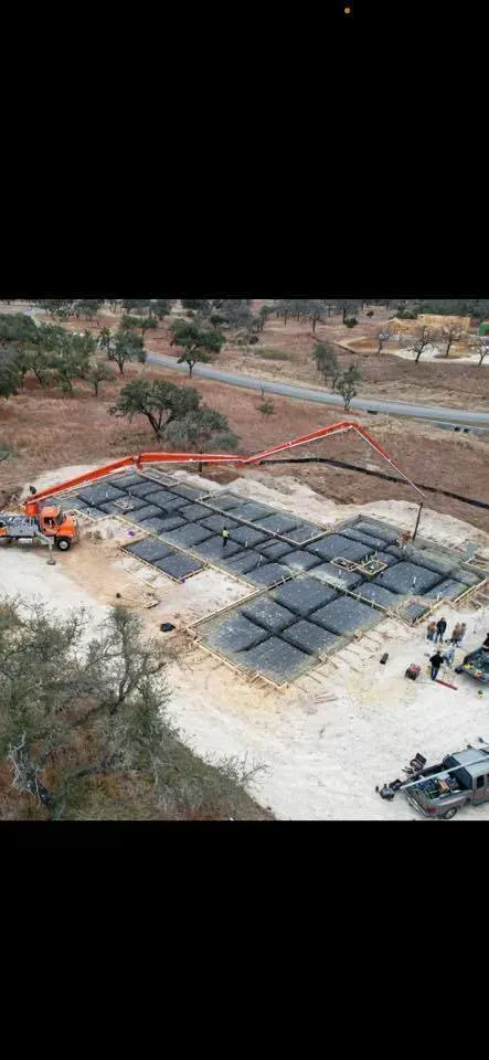 An aerial view of a building under construction.