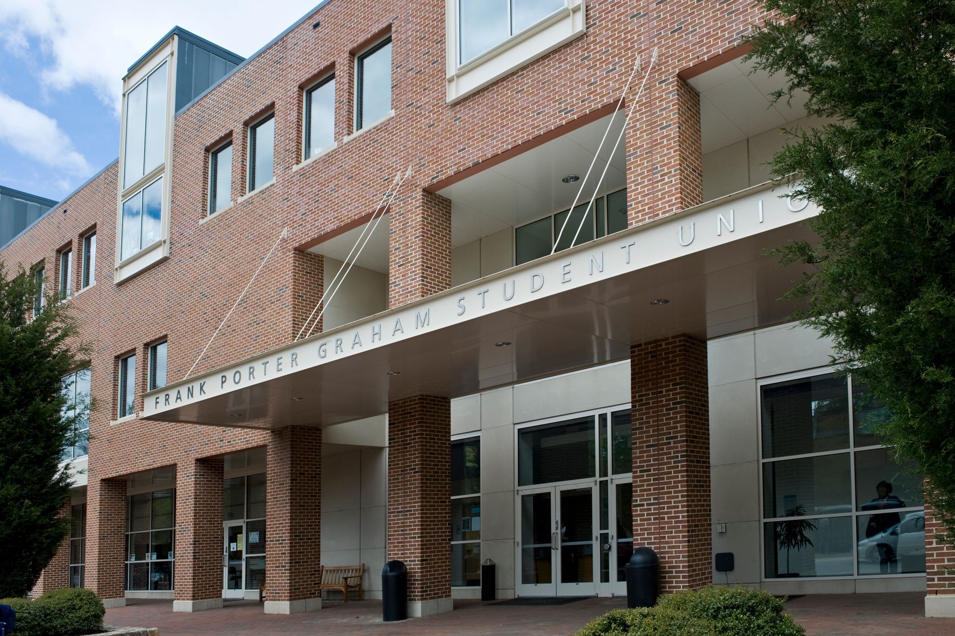 A large brick building with a canopy over the entrance