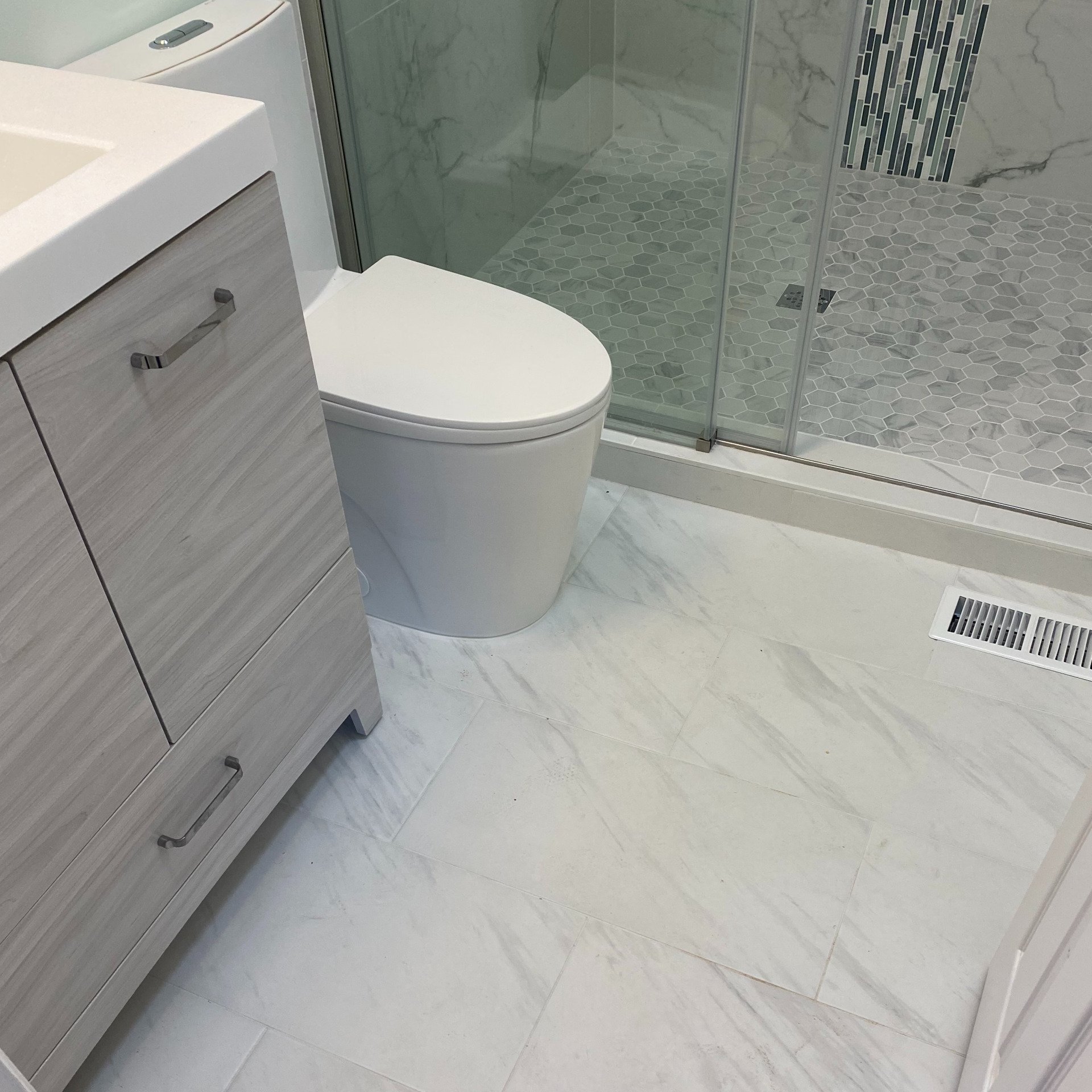 Toilet Bowl and Tiles Flooring