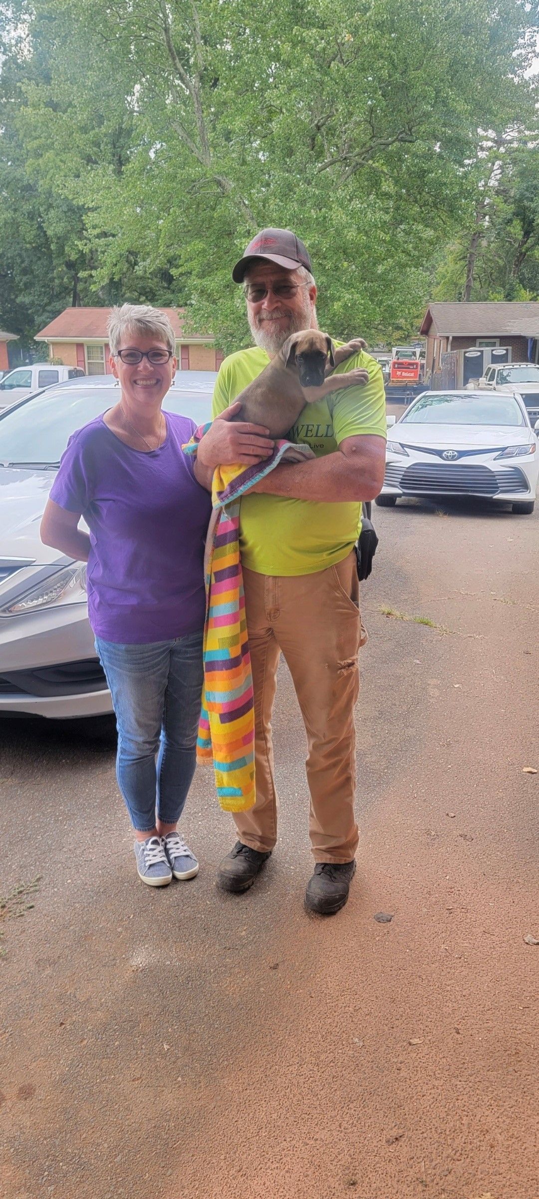 A puppy with its new owner — Charlotte, SC — Angel Danes of Charlotte