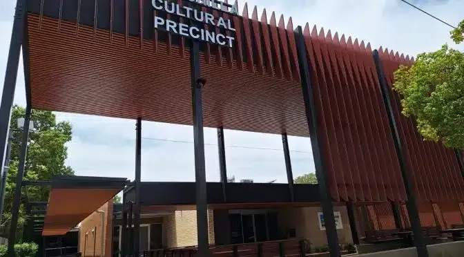 A Large Building With a Sign That Says Cultural Precinct on It — Siash Construction Group in Gooburrum, QLD