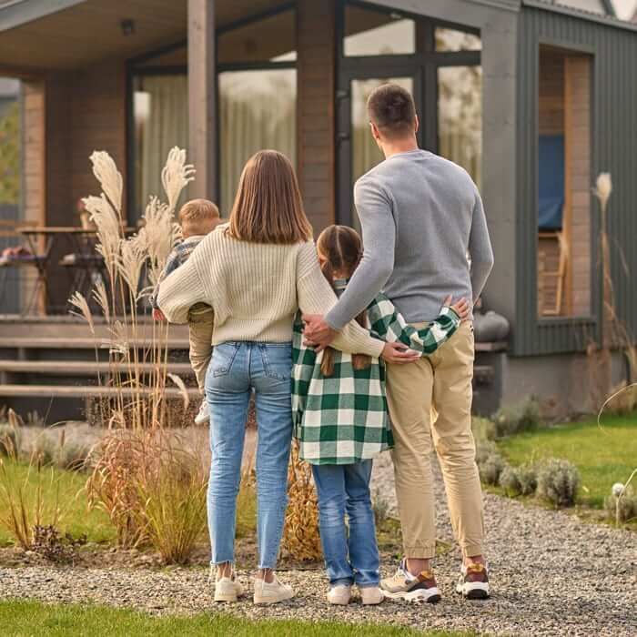 Family looking at the house