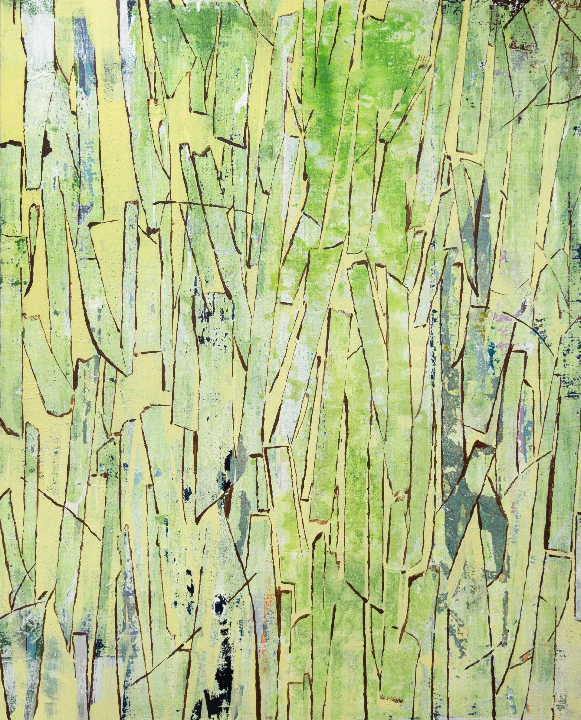 A close up of a green and yellow painting on a wall.