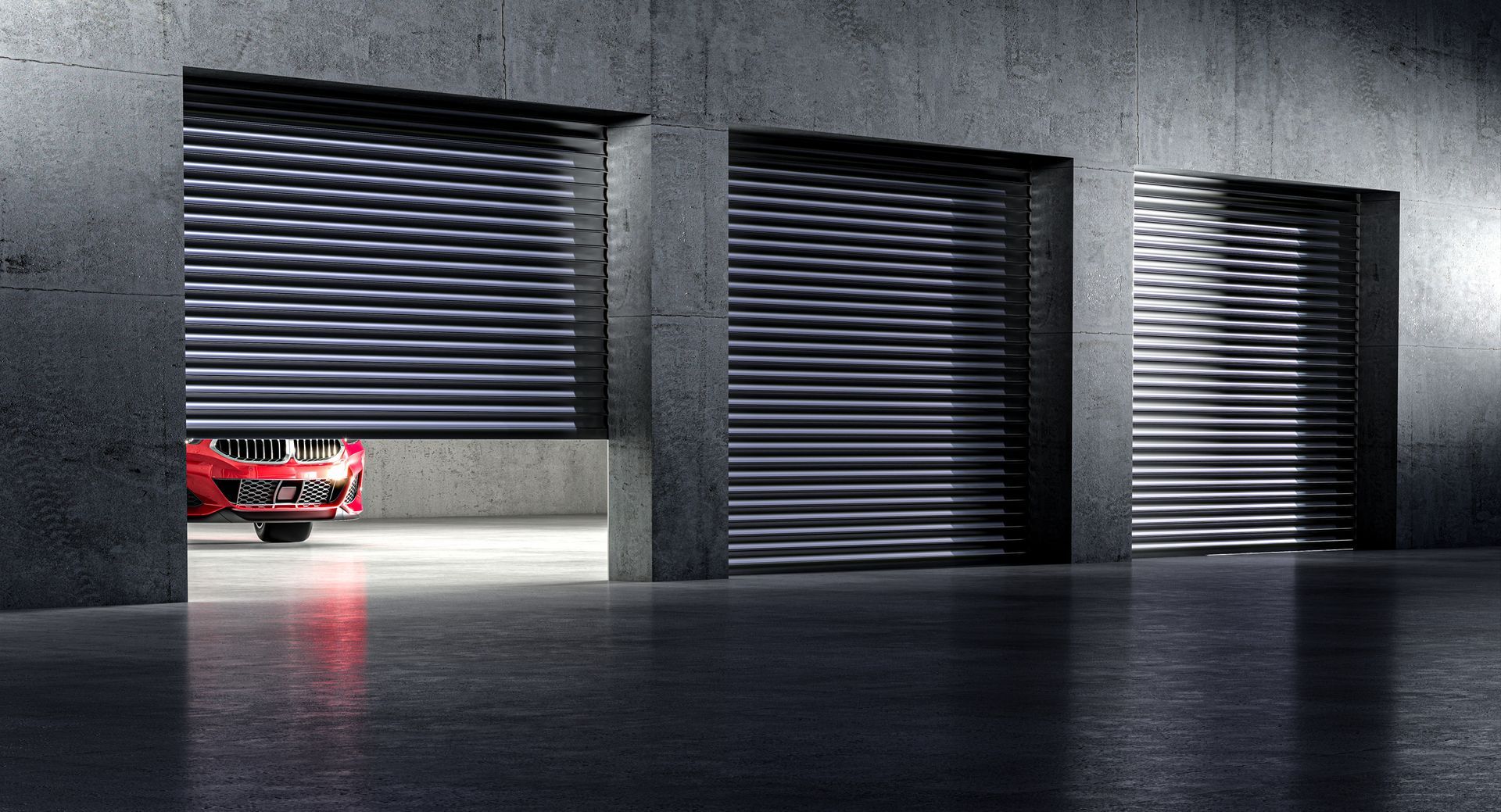Three grey roller shutter doors in a concrete building. One partially open with red car headlights visible.